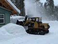 Blowing snow with ASV Posi-Track and Unimog