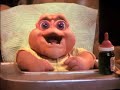 baby sinclair gets into the fridge when his brother and sister leave him alone in the kitchen.