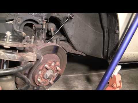 How-To Replace Front Struts om Most Cars : 2001 Mazda Protege Example