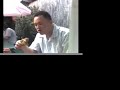 Sam Chang eating a Habanero Burger Sam Chang eating a Habanero Burger
