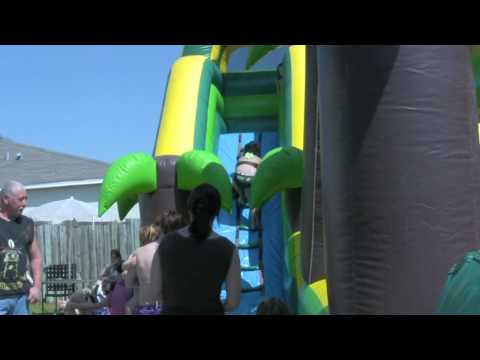 Baby falls down a water slide