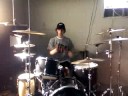 Elias playing the drums