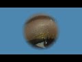 Dramatic gold glitter look.