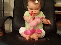 Ali playin with her pink puppy