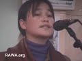 A student of RAWA orphanage declaims poem in a RAWA event A student of RAWA orphanage declaims poem in a RAWA event