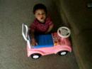 Malik pushing the pink walker