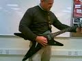 Mr. Dearing playing the guitar