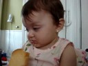 Cleo falling asleep on her bumbo chair while eating a paximathi!