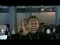mabel van oranje does a dance behind wikipedia founder jimmy wales as he prepares for a high pressure interview.
original posting:
http://www.thomascrampton.com/2007/09/06/light-moment-mabel-dances-for-jimmy/
