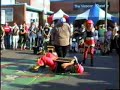 Powerman stands on Ryan stock while on bed of nails