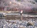Curtis catching a brown trout