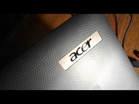 how to insert c.d in acer laptop