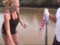 Heather & Jeff land a big 5' needle nose gar. There were a few good catfish caught today too!