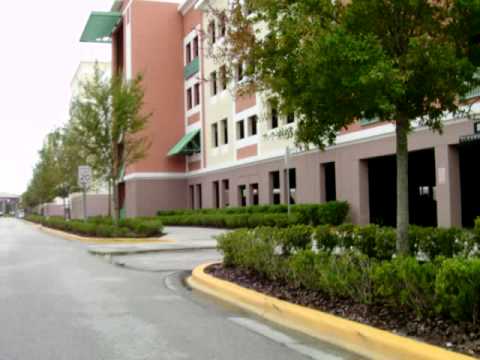 cabbike - My commute to work takes me through a part of the campus of University of Central Florida. Out the window of the Cab-bike you can see some dormitories and a ...