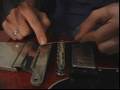 How to Change Strings & Tune a Guitar : Beginning to Restring a Guitar