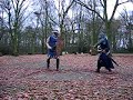 knoxy and Kim fighting with axe and sword and shield