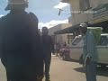 Tailing riot police in Harare