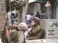 Palestinian teenager being held as human shield View Video
