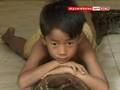 Cambodian Boy Keeps Python Pet
