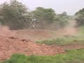 Toomy Searle taking on a 100' triple jump while practising during 2008