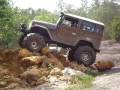 1977 toyota fj40 rockcrawling , 40 inch tires    almost flips , red neck yacht club