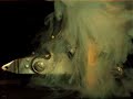 this is a large siler lock chipped english flint, bevel up.  the priming powder is goex ffg.  particles of powder can be seen highlighted against the igniting powder.  grains were bounced into the air prior to ignition.  camera is olympus at 5000 fps