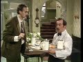 Basil gives Manuel a language lesson