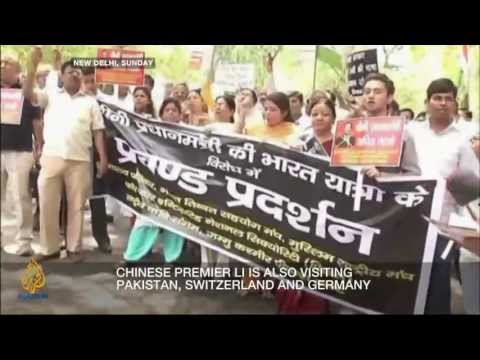 China - China's Premier arrives in India for his first foreign trip since taking office. It is a sign of improving relations, after decades of disagreements. Togethe...