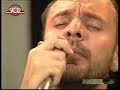 a song written by giannhs spanos, lyrics by lefterhs papadopoulos, originally sung by grigoris bithikotsis.

musicians:
=========
bouzouki: kostas papadopoulos
singer: alekos delhgiannhs
singer: stavroula manwlopoulou
guitar: giorgos fountoukos
bass: antonis tzikas

broadcasted on greek 902 channel, in the tv show 