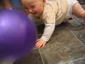 Baby Cam laughing at balloon being kicked at him!