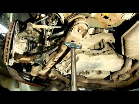 How to Install a Monroe Quick-Strut Assembly 2004 Ford Taurus SES