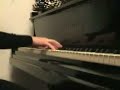 Young girl (Marysia Orze?) playing piano fast