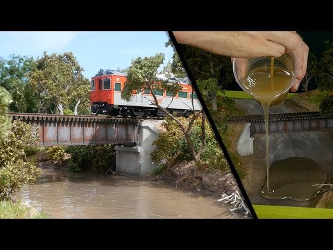 Diorama ultra-realista con un rio embarrado bajo un viaducto para trenes [ENG]