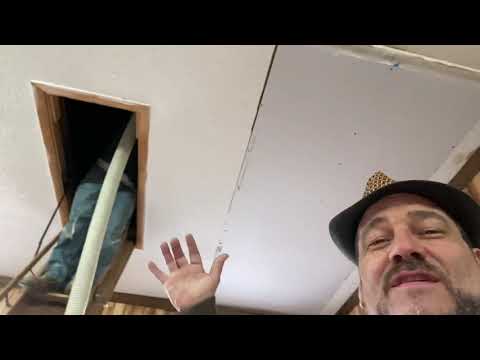 Attic insulation blowing