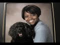 Shawna Sims shows off her dog, Preston, adopted from HSI