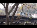 CSX Freight eastbound at Harpers Ferry bridge from Maryland shore handheld CX500V