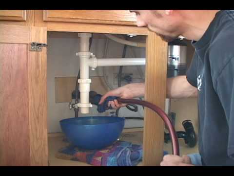 how to unclog a kitchen sink full of water