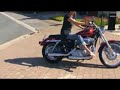 Kate Watts on Harley Davidson with rinehart exhaust