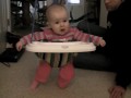 Bouncing and saying 'Dada'