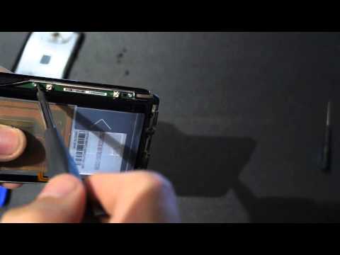 how to open droid x battery cover