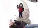 Big sis getting hit with snowball