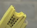 A Taser stun gun in action