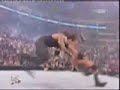 Undertaker goes for Chokeslam and gets the RKO