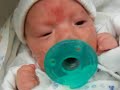 A boy and his pacifier