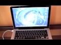 macbook on glass desk