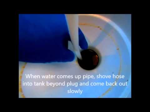 how to unclog trailer toilet