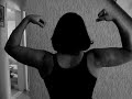 Woman flex and kiss biceps
