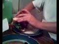Ry eating the Bacon Burger Dog