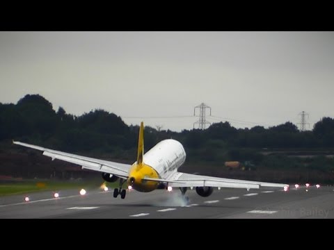 MONARCH A320 AWFUL LANDING IN STRONG WINDS & WIND SHEAR