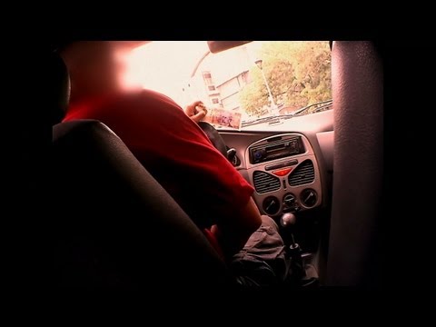 Scam - Host Conor Woodman exposes a taxi driver handing out counterfeit change to customers. | For more Scam City, visit http://science.discovery.com/tv-shows/scam-...
